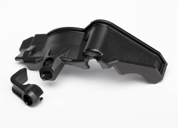 Black cover for a remote control toy's gear/wire, with a visible securing mechanism.