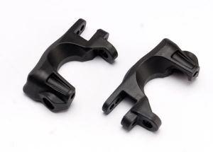 A pair of black caster blocks for a remote control vehicle.