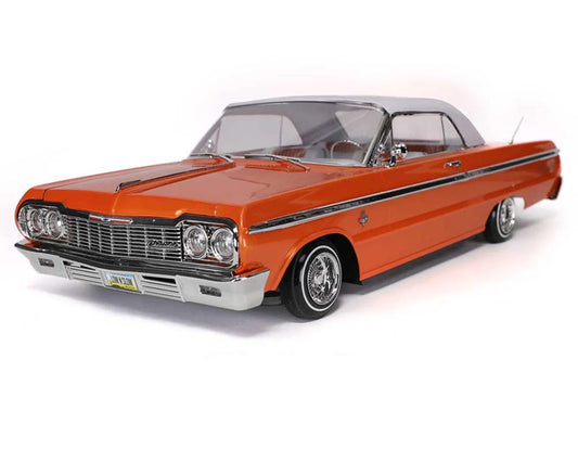 RER32895    Redcat SixtyFour Chevrolet Impala 1/10 RTR Scale Hopping Lowrider (Orange/White) w/2.4GHz Radio   |The RC Shop at Dr Dans