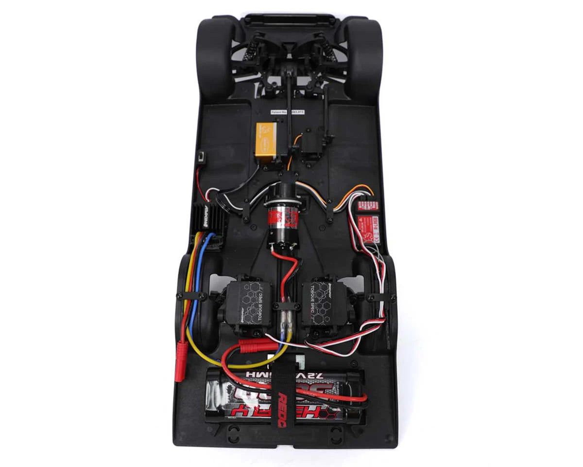 RER32895    Redcat SixtyFour Chevrolet Impala 1/10 RTR Scale Hopping Lowrider (Orange/White) w/2.4GHz Radio   |The RC Shop at Dr Dans