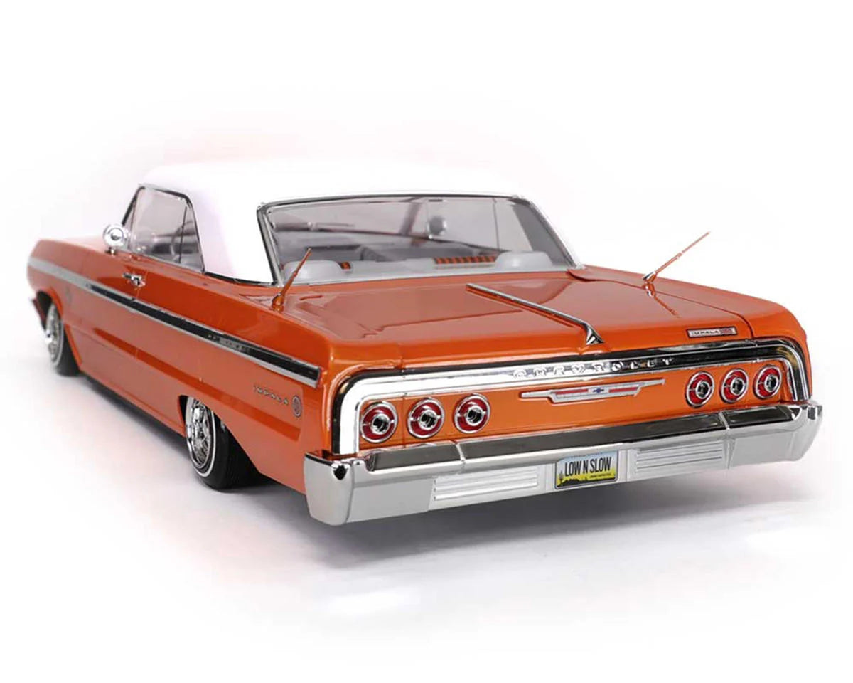 RER32895    Redcat SixtyFour Chevrolet Impala 1/10 RTR Scale Hopping Lowrider (Orange/White) w/2.4GHz Radio   |The RC Shop at Dr Dans